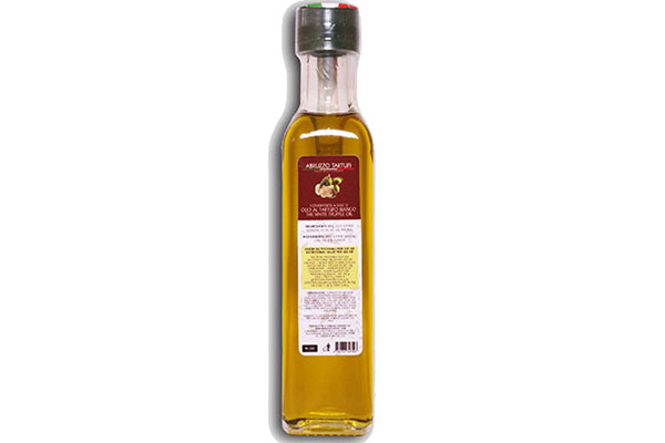 Extra virgin olive oil dressing based white truffle bottle